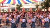 Học sinh Trường Tiểu học Lê Đức Thọ (quận Gò Vấp) trong ngày khai giảng năm học mới