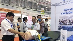 Visitors to the 20th International Medical, Hospital & Pharmaceutical Exhibition that opened on August 11 in HCM City. (Photo: VNA)