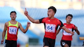 Ngần Ngọc Nghĩa (CAND) phá kỷ lục quốc gia ở cự ly 100m nam. Ảnh: MINH HOÀNG