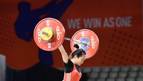Nữ lực sĩ Vương Thị Huyền sẽ cùng các đồng đội sang Uzbekistan tranh vé Olympic.