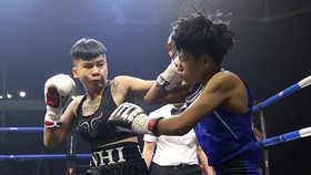 Võ sĩ Nguyễn Thu Nhi từng thượng đài ở sân chơi chuyên nghiệp.
