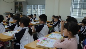 Bộ GD-ĐT khuyến khích tổ chức dạy bơi cho học sinh trong và ngoài nhà trường. Ảnh: QUANG PHÚC