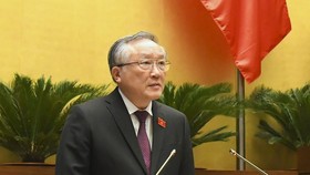 Chánh án Tòa án nhân dân tối cao Nguyễn Hòa Bình trình bày Báo cáo công tác năm 2021 của Chánh án Tòa án nhân dân tối cao