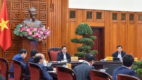 Thủ tướng Phạm Minh Chính làm việc với Bảo hiểm xã hội Việt Nam. Ảnh: VIẾT CHUNG