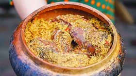 The braised fish clay pot (Photo: SGGP)