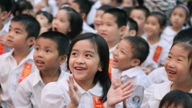 Localities ordered to work harder on child education and protection. - Illustrative image (Photo: VNA)