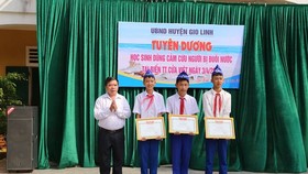 Three eight graders honored for heroic efforts in rescuing friends