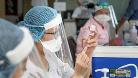HCMC announced 473 residential areas under lockdown as infections surge