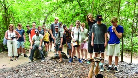 Shelter's entrance camouflaged with fallen leaves surprised foreign visitors. Photo vietnamtourism.gov.vn