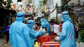 HCMC performs dual plan of quarantine against Covid-19, production