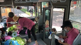 HCMC launches “mobile markets” on buses