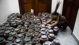 Quảng Ngãi:Người giữ hương vị men rừng rượu cần