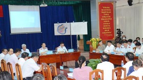 The Government Inspectorate and HCMC People’s Committee speaking with people from the Thu Thiem new urban area (Photo: SGGP)