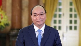 APEC serve as a driver for global growth: President Phuc