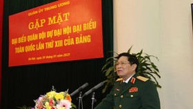 Đại tướng Ngô Xuân Lịch phát biểu tại buổi gặp mặt. Ảnh: TTXVN