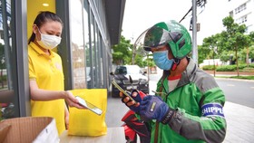 Grab hỗ trợ chi phí xét nghiệm Covid-19 cho đối tác tài xế