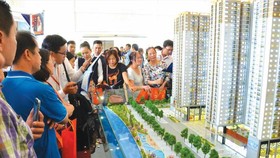 Tín dụng bất động sản dồn về Hà Nội và TPHCM
