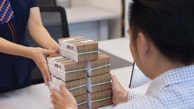 Tín dụng mua nhà tăng 20%/năm trong 5 năm qua, cao hơn con số tăng trưởng 15,4% của toàn ngành. Ảnh: Dũng Minh.