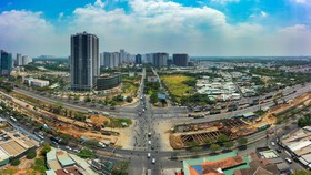 Sở Xây dựng TPHCM đề nghị có các biện pháp xử lý kịp thời đề bình ổn thị trường bất động sản, không xảy ra tình trạng sốt giá và bong bóng bất động sản. Ảnh: Chí Hùng.