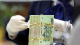 Chủ tài khoản ngân hàng cẩn thận trước những chiêu lừa đảo mới. Ảnh: Ngọc Thắng
