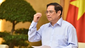 Thủ tướng: Bất kỳ lúc nào và nhất là những lúc khó khăn, Chính phủ thể hiện và khẳng định tinh thần đổi mới, liêm chính, hành động, phục vụ người dân và doanh nghiệp. Ảnh: VGP