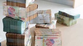 Doanh nghiệp được giải ngân vay vốn hỗ trợ trả lương rất ít. Ảnh: Ngọc Thắng