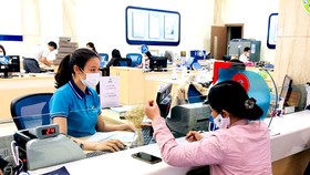 Phó thống đốc Đào Minh Tú: Ngân hàng thương mại như đang đi trên dây