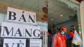 Cùng với đánh giá cấp độ dịch, TPHCM cũng nghiên cứu thí điểm mở lại dịch vụ ăn uống tại chỗ. Ảnh: TT