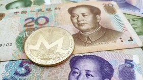 Trung Quốc hiện là quốc gia thúc đẩy mạnh mẽ việc phát triển đồng tiền kỹ thuật số quốc gia. Ảnh: Reuters