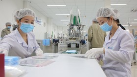 Doanh nghiệp trong nước sản xuất khẩu trang y tế xuất khẩu sang Mỹ