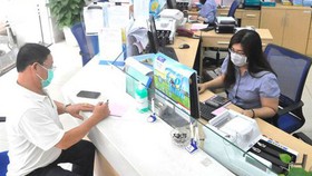Quản lý chặt tín dụng bất động sản