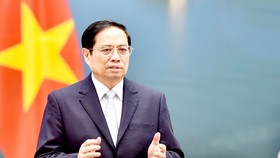 Thủ tướng Phạm Minh Chính phát biểu tại Diễn đàn “Tuần lễ Năng lượng Nga” lần thứ IV. Ảnh: TTXVN