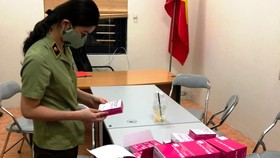 Lực lượng quản lý thị trường Hà Nội thu giữ lượng lớn kit test nhanh Covid-19 không rõ nguồn gốc