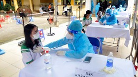 Học sinh tại Củ Chi vui mừng vì được tiêm vaccine
