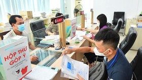 Quận 3 xây dựng quy trình giải quyết công việc khoa học giúp giảm họp, tăng chất lượng phục vụ người dân Ảnh: VIỆT DŨNG