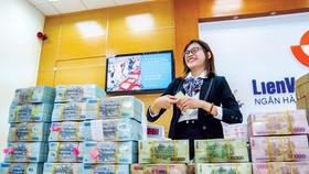 Cho vay là hoạt động chủ yếu của NH, nếu không yêu cầu hỗ trợ NH cũng tìm cách cho vay nhưng phải đủ chuẩn. Ảnh: VIẾT CHUNG