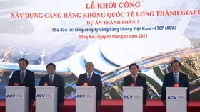Thủ tướng Chính phủ Nguyễn Xuân Phúc nhấn nút khởi công dự án sân bay Long Thành. (Ảnh: Việt Hùng/Vietnam+)