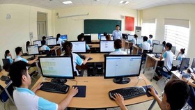 Sinh viên trong giờ học công nghệ thông tin. (Ảnh minh họa: Thanh Hà/TTXVN)