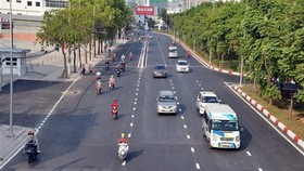Đường Nguyễn Hữu Cảnh được nâng cấp, có khả năng giải quyết điểm ngập hơn 10 năm qua của Thành phố. (Ảnh: Tiến Lực/TTXVN)