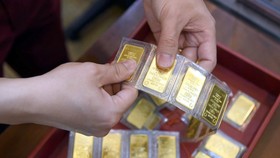 Vàng SJC đang giảm giá chậm