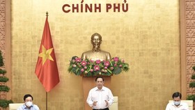 Thủ tướng Phạm Minh Chính chủ trì phiên họp Chính phủ thường kỳ tháng 8 năm 2021. Ảnh: VIẾT CHUNG