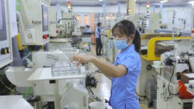Kinh tế đang hồi phục: Chạy đua với đơn hàng