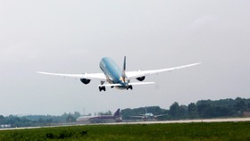 Hiện nay Vietnam Airlines vẫn khai thác các chuyến bay quốc tế không thường lệ theo cách thức cấp phép từng chuyến bay của nhà chức trách hàng không - Ảnh: TUẤN PHÙNG