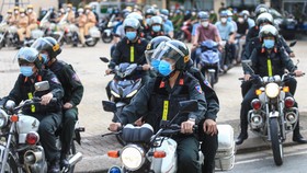 Công an TPHCM bắt nhiều tội phạm sau khi nới lỏng giãn cách. Ảnh: DŨNG PHƯƠNG
