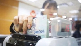 NHNN khẳng định sẽ tiếp tục đẩy mạnh các giải pháp để tạo điều kiện thuận lợi cho người dân, doanh nghiệp tiếp cận vốn phục vụ sản xuất, kinh doanh