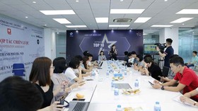 The press conference to announce ‘Vietnam Top-10 ICT Businesses 2021’ program by VINASA. (Photo: SGGP)
