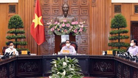 Prime Minister Pham Minh Chinh is delivering his speech in the meeting with MIC. (Photo: SGGP)
