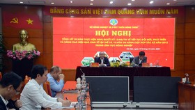 Quang cảnh hội nghị tại điểm cầu Hà Nội. Ảnh: NGUYỄN KIỂM