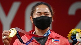 Hidilyn Diaz đi vào lịch sử khi là VĐV đầu tiên của Philippines giành HCV tại một kỳ Olympic. Ảnh: AFP