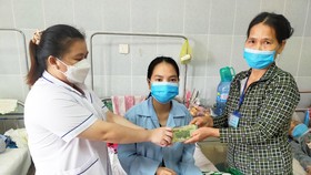Trao 38,5 triệu đồng bạn đọc Báo SGGP giúp 2 hoàn cảnh ở Bình Định